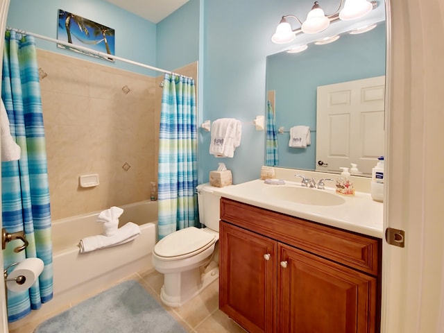 full bathroom featuring tile patterned floors, vanity, toilet, and shower / bath combo with shower curtain