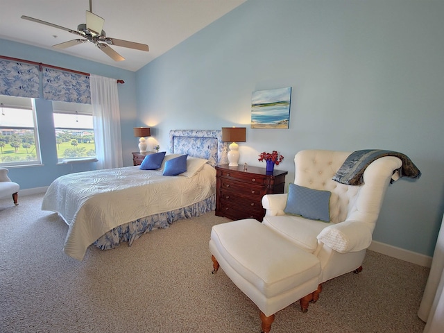 bedroom featuring ceiling fan, carpet floors, and lofted ceiling