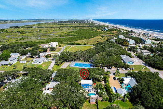 aerial view with a water view and a view of the beach