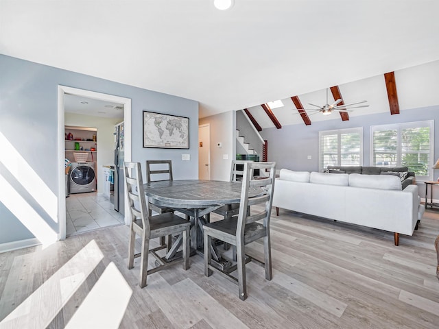 dining room with lofted ceiling with beams, ceiling fan, and light wood-type flooring