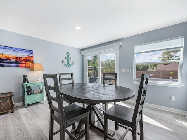 dining space featuring light hardwood / wood-style flooring