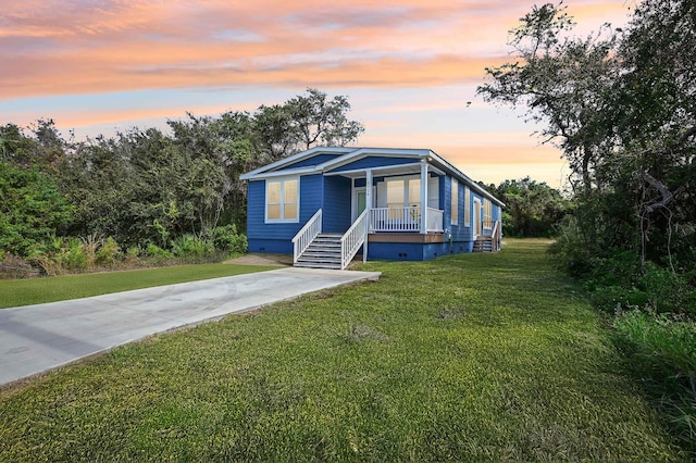 4954 A1A, Saint Augustine, FL 32080 - manufactured / mobile home with crawl space, a porch, and a front yard