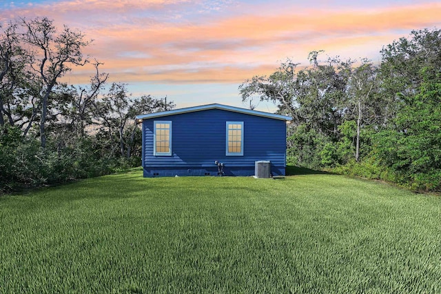 4954 A1A, Saint Augustine, FL 32080 - back of house with central air condition unit, a yard, and crawl space
