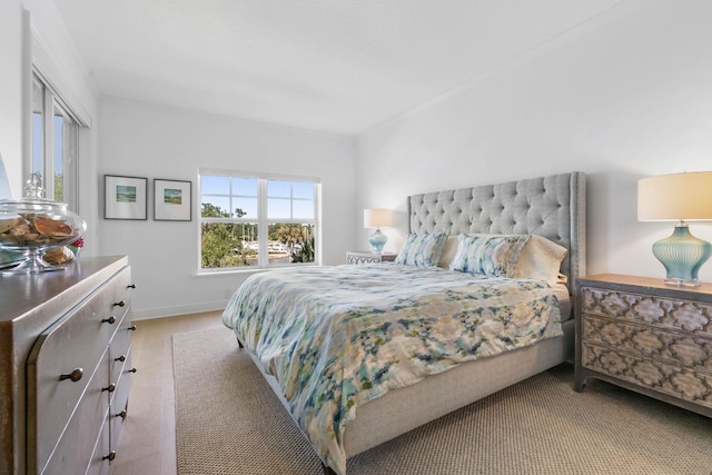 bedroom featuring baseboards