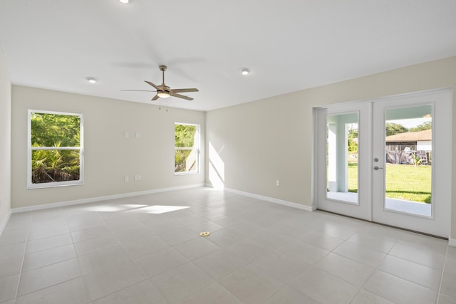 53 Pine Crest Ln, Palm Coast, FL 32164 - empty room featuring baseboards, french doors, ceiling fan, light tile patterned floors, and recessed lighting