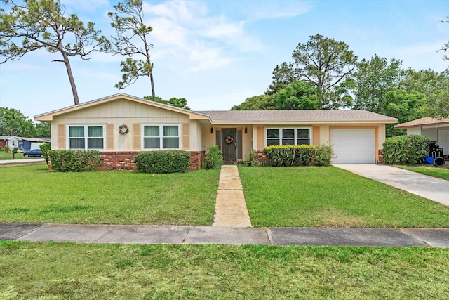 ranch-style house with a front yard, driveway, an attached garage, and brick siding