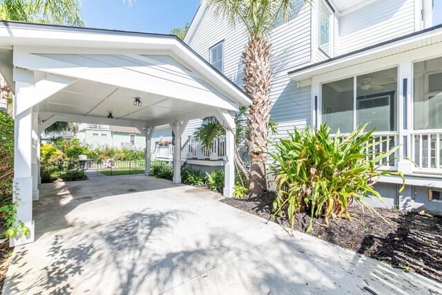 view of patio / terrace with a carport