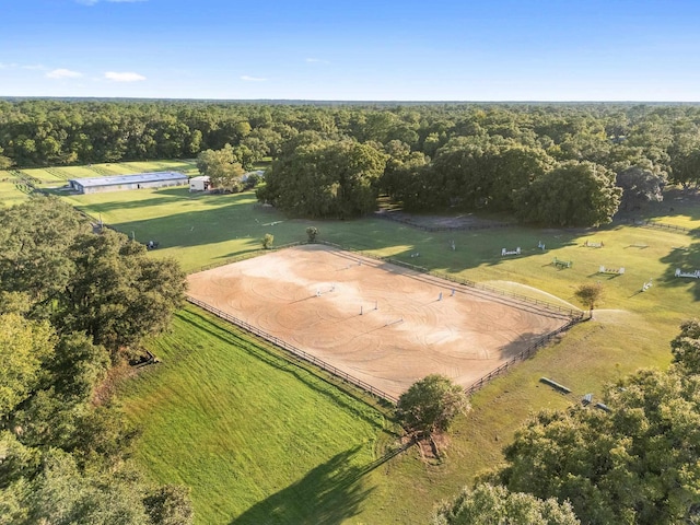 birds eye view of property featuring a rural view