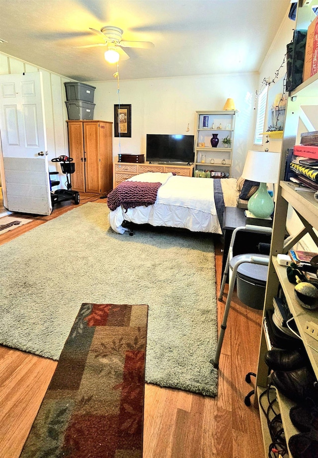 bedroom with wood-type flooring