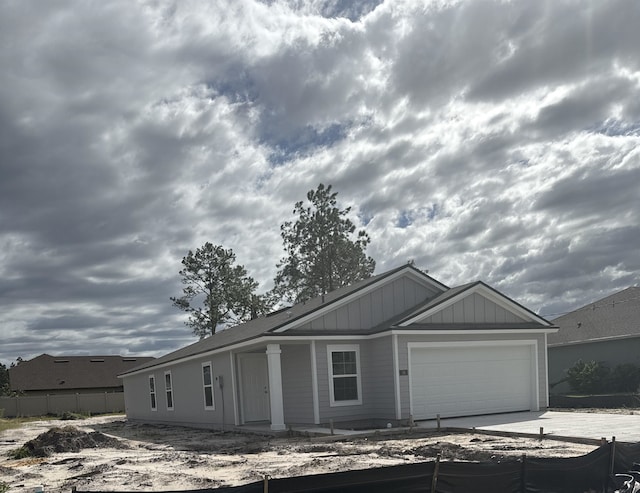 view of front of property featuring a garage