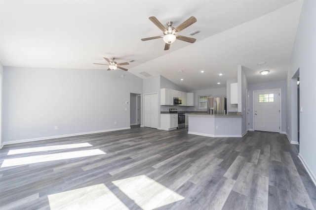 10690 Carpenter Ave, Hastings, FL 32145 - unfurnished living room featuring ceiling fan, vaulted ceiling, and wood finished floors