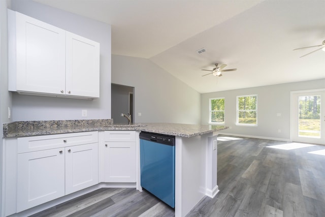 kitchen featuring sink, hardwood / wood-style flooring, dishwasher, white cabinetry, and lofted ceiling