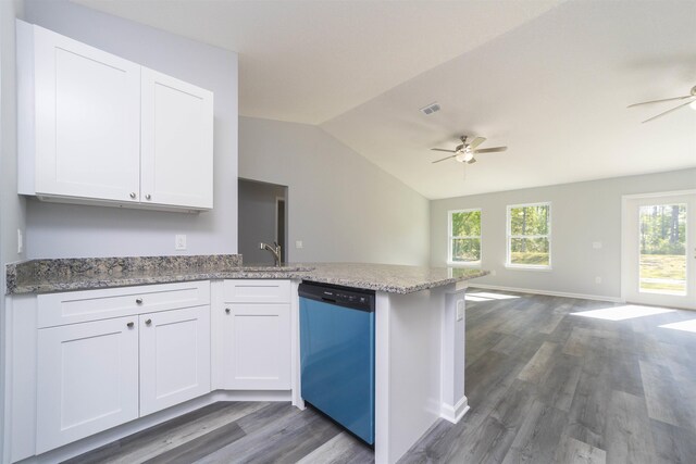 10690 Carpenter Ave, Hastings, FL 32145 - kitchen featuring dishwashing machine, ceiling fan, open floor plan, dark wood finished floors, and vaulted ceiling