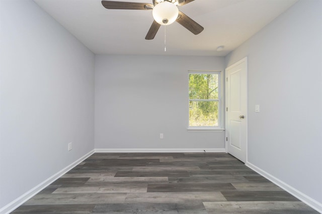 unfurnished room with ceiling fan and dark hardwood / wood-style floors