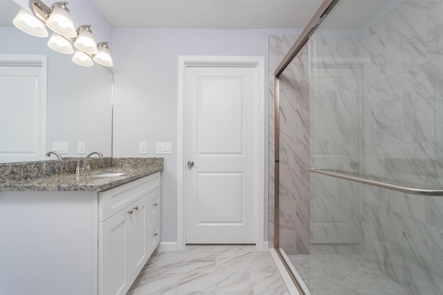 bathroom with vanity and walk in shower