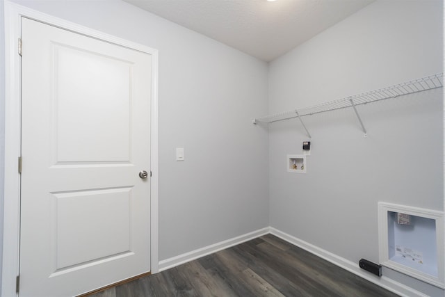 laundry room with hookup for a washing machine, dark hardwood / wood-style flooring, a textured ceiling, and hookup for an electric dryer