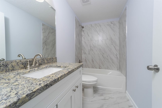 full bathroom with a textured ceiling, vanity, toilet, and tiled shower / bath