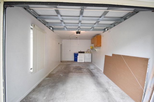 101 Vista Lagoon Ct Unit A-4, Ponte Vedra Beach, FL 32082 - garage with independent washer and dryer and a garage door opener
