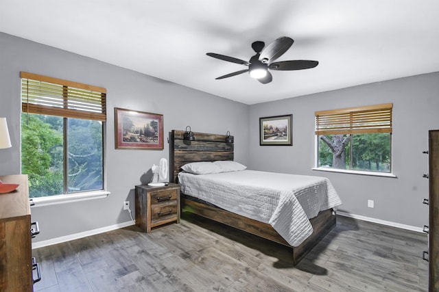 101 Vista Lagoon Ct Unit A-4, Ponte Vedra Beach, FL 32082 - bedroom with multiple windows, wood finished floors, baseboards, and ceiling fan