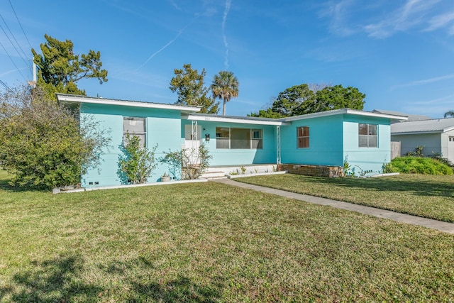 ranch-style home with a front yard