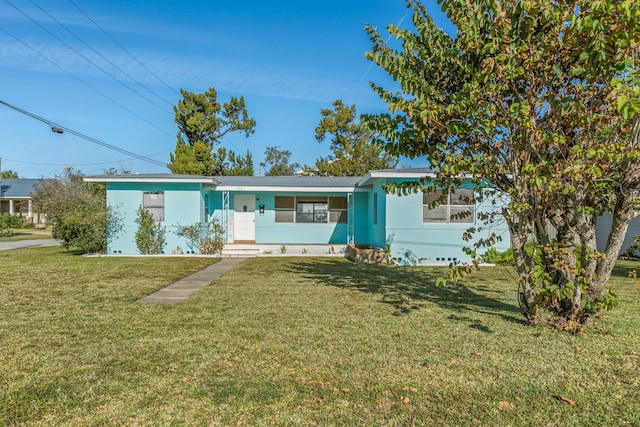 ranch-style house with a front yard