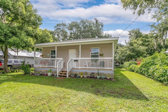 bungalow-style home with a porch and a front yard