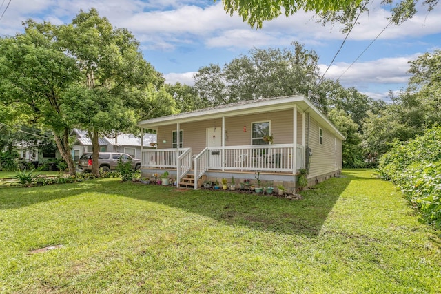 view of front facade with a porch and a front yard