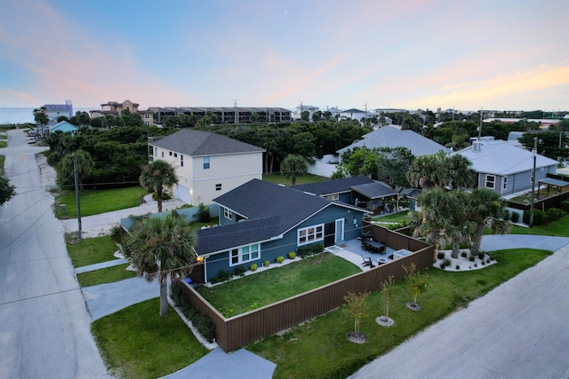 aerial view at dusk with a residential view