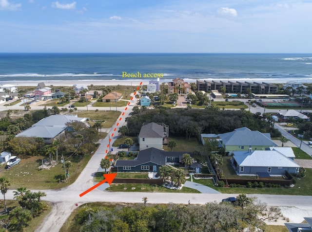 aerial view with a water view and a residential view