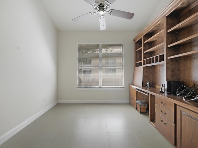 unfurnished office featuring ceiling fan