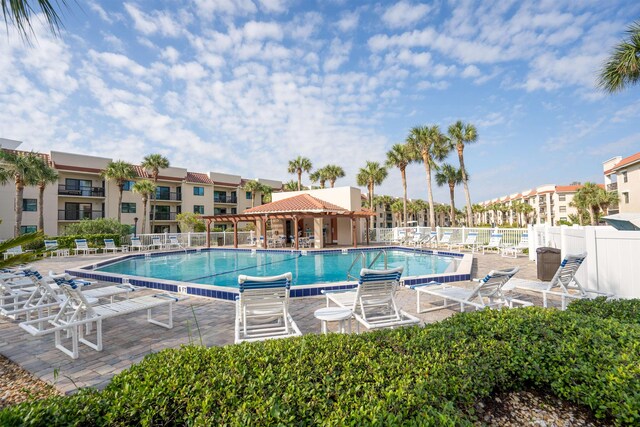 view of swimming pool featuring a patio area