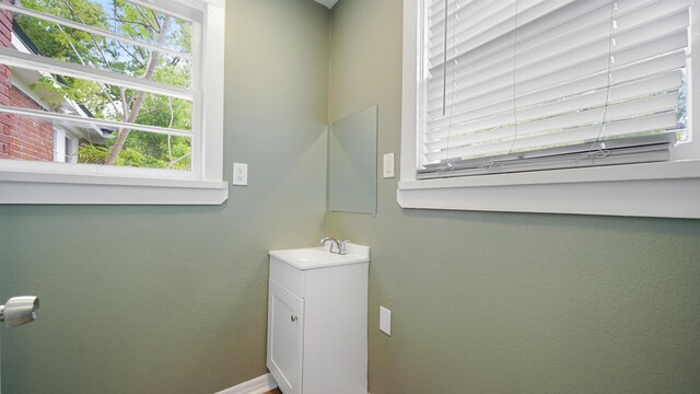 819 Mcduff Ave, Jacksonville, FL 32205 - bathroom featuring a wealth of natural light and vanity