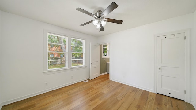 819 Mcduff Ave, Jacksonville, FL 32205 - unfurnished bedroom featuring visible vents, light wood-type flooring, baseboards, and ceiling fan