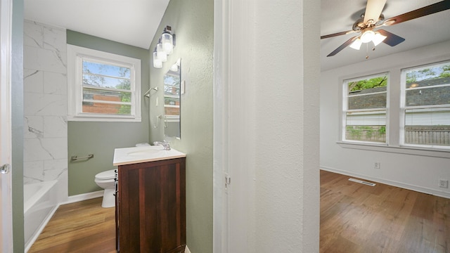 819 Mcduff Ave, Jacksonville, FL 32205 - bathroom with visible vents, toilet, vanity, and wood finished floors