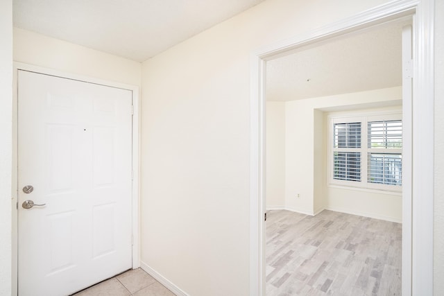 foyer with light hardwood / wood-style flooring