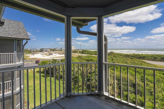 exterior space with a view of the beach and a water view