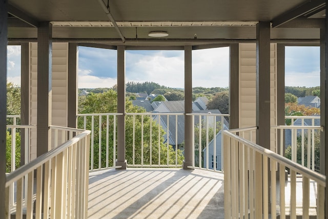 unfurnished sunroom with a wealth of natural light