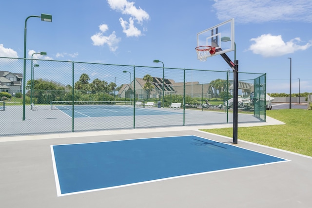 view of sport court with tennis court