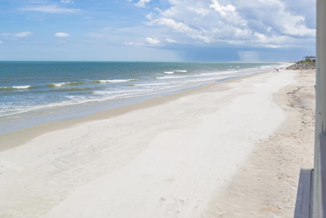 property view of water featuring a beach view