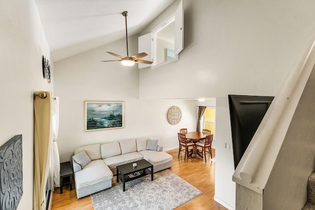 4502 Sandcastle Cir, Saint Augustine, FL 32084 - living room with a ceiling fan, light wood-style floors, and high vaulted ceiling