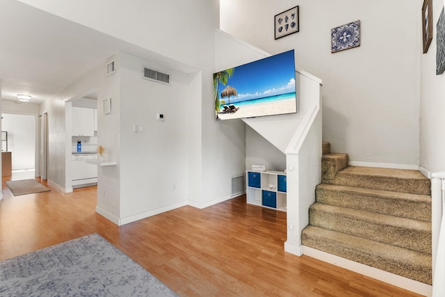 4502 Sandcastle Cir, Saint Augustine, FL 32084 - staircase featuring wood finished floors and baseboards