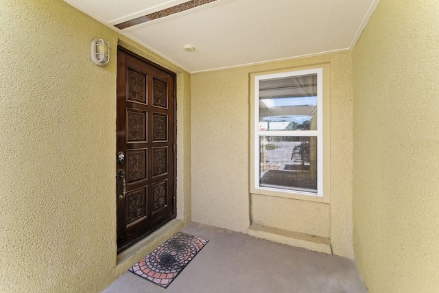 4502 Sandcastle Cir, Saint Augustine, FL 32084 - view of exterior entry with stucco siding