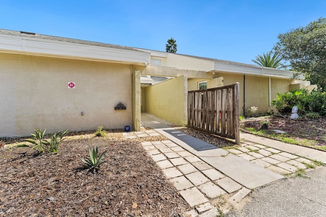4502 Sandcastle Cir, Saint Augustine, FL 32084 - entrance to property featuring stucco siding