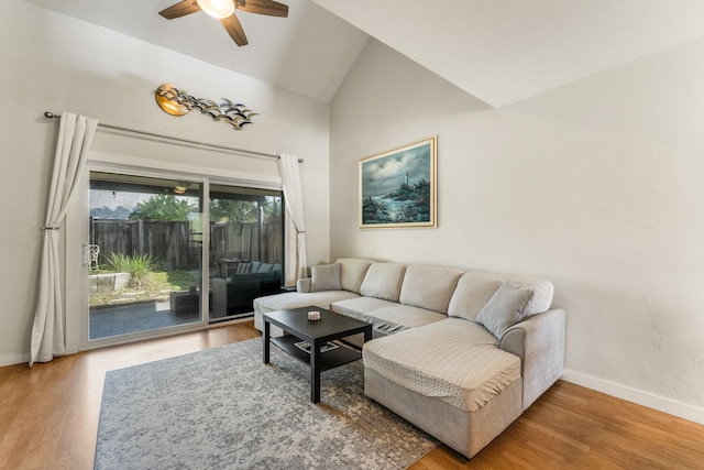 4502 Sandcastle Cir, Saint Augustine, FL 32084 - living room featuring ceiling fan, wood finished floors, and high vaulted ceiling