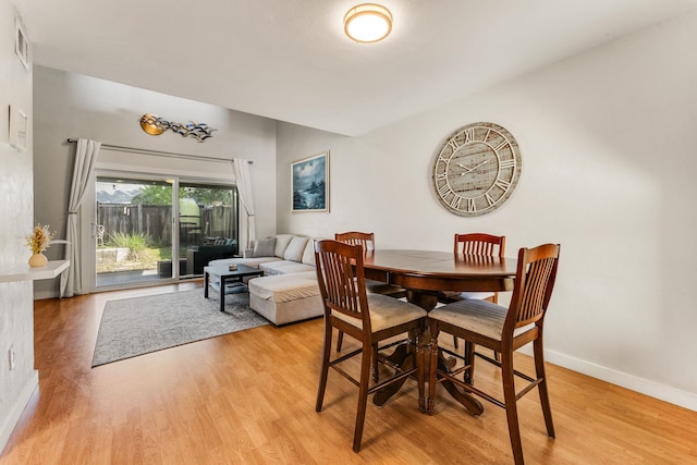 4502 Sandcastle Cir, Saint Augustine, FL 32084 - dining area with light wood-style flooring