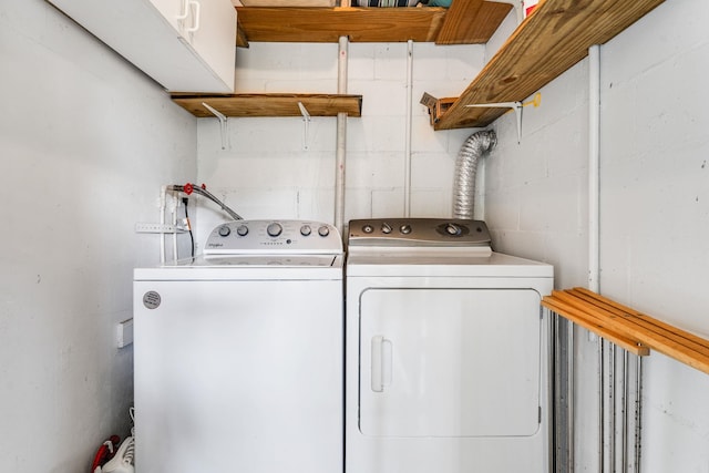 4502 Sandcastle Cir, Saint Augustine, FL 32084 - washroom featuring washing machine and dryer and concrete block wall