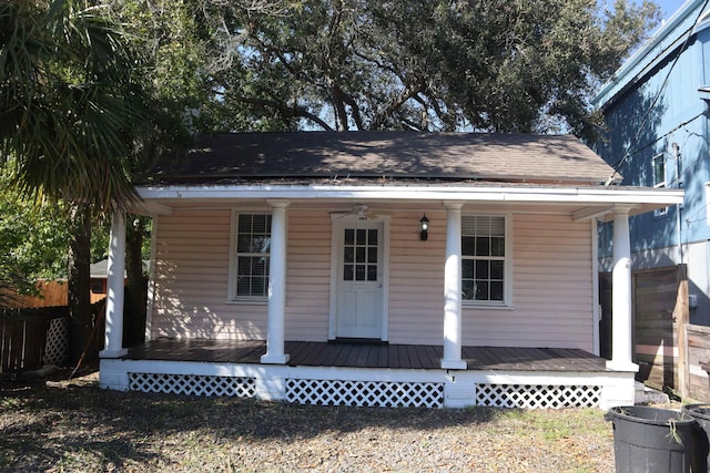 view of front of home featuring ceiling fan and covered porch