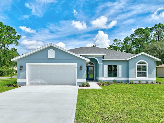 single story home with a front yard and a garage