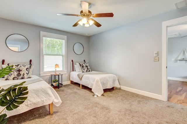 bedroom with ceiling fan and hardwood / wood-style flooring