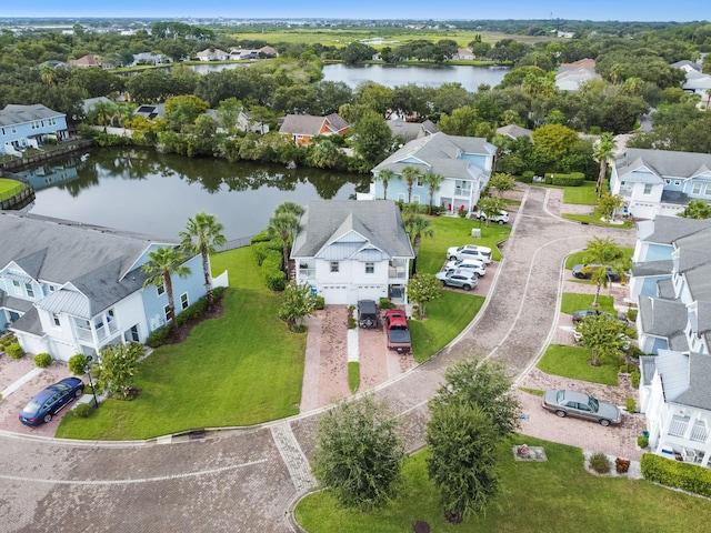 aerial view with a water view and a residential view